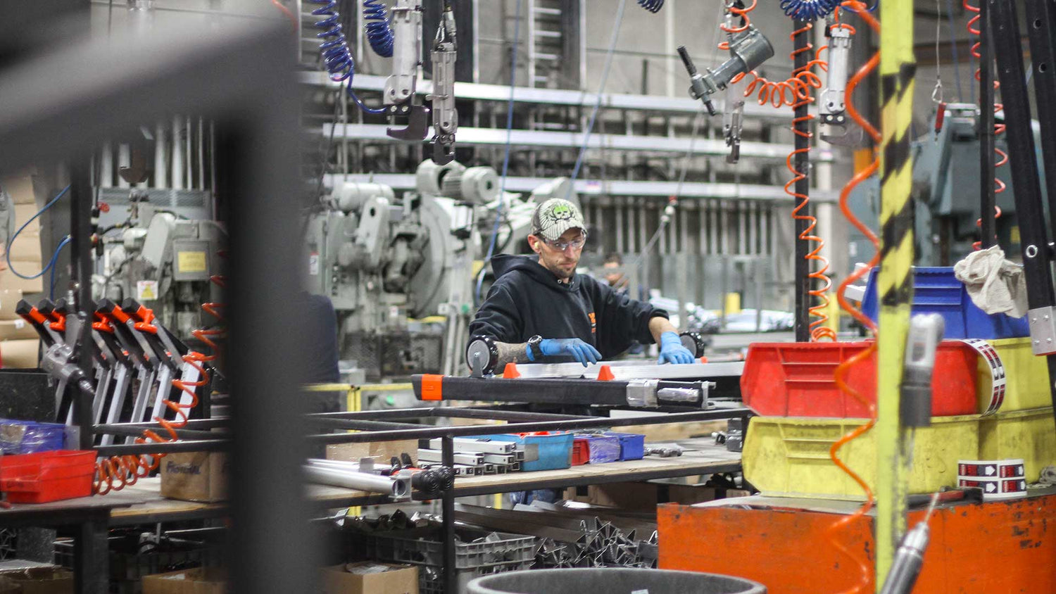 Little Giant Ladder Systems employee making a ladder in Springville, Utah factory