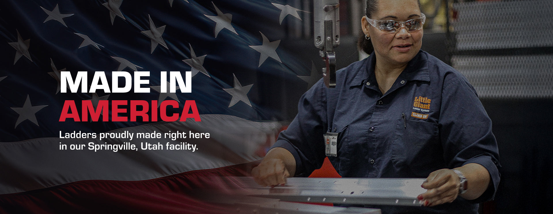 Little Giant employee in a blue uniform working on a task with an American flag in the background